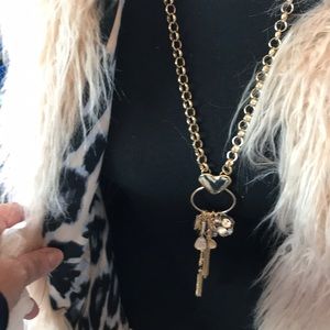 bebe gold necklace with charms .. long